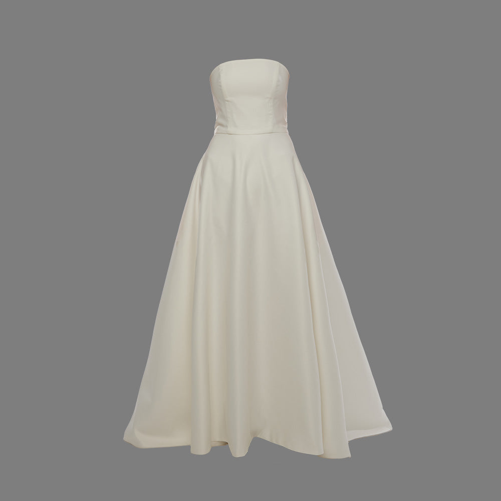 White Maxi Eve dress made from Mikado fabric and a corseted straight neckline exuding timeless elegance. Explore evening dresses for women. Shop now!