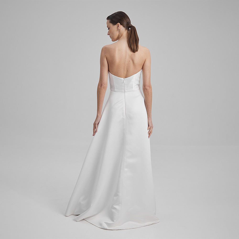 White Maxi Eve dress made from Mikado fabric and a corseted straight neckline exuding timeless elegance. Explore evening dresses for women. Shop now!