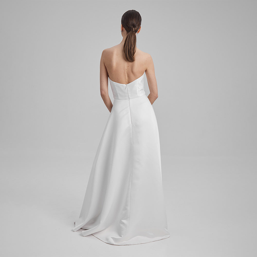 White Maxi Eve dress made from Mikado fabric and a corseted straight neckline exuding timeless elegance. Explore evening dresses for women. Shop now!