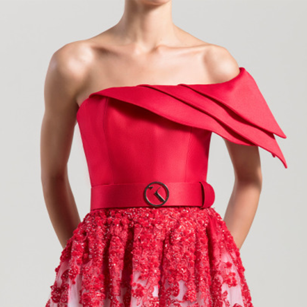 Ankle length dress with one shoulder, multi-layered top and tulle skirt, fully embroidered at the top fading downwards. 