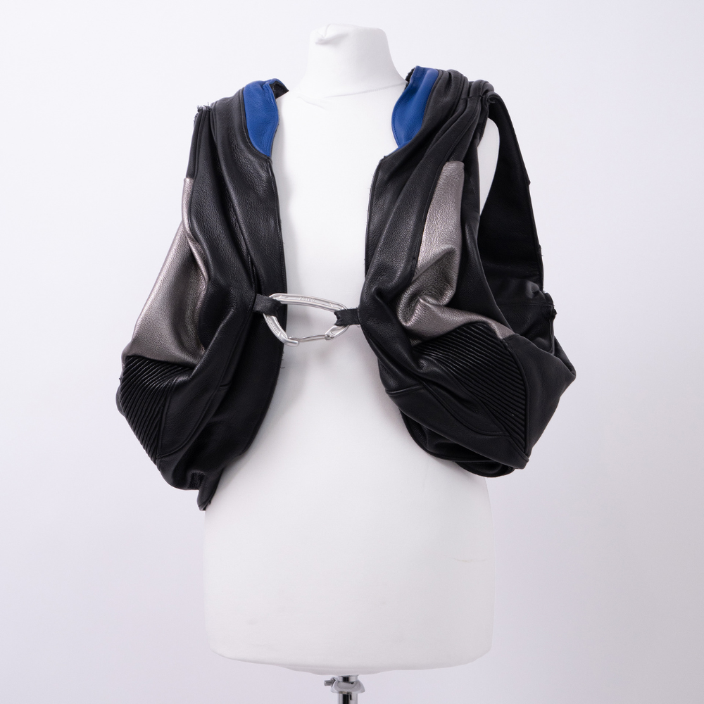 Shop online from our exclusive website and discover the Exosphere Leather Top by Voitech®, crafted from premium multi-texture leather with an exoskeletal design and futuristic hardware detailing.
