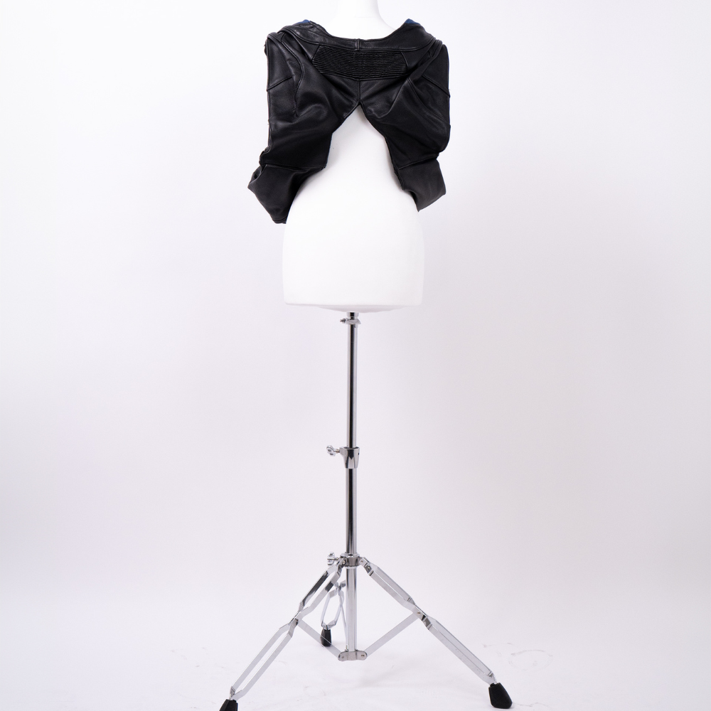 Shop online from our exclusive website and discover the Exosphere Leather Top by Voitech®, crafted from premium multi-texture leather with an exoskeletal design and futuristic hardware detailing.