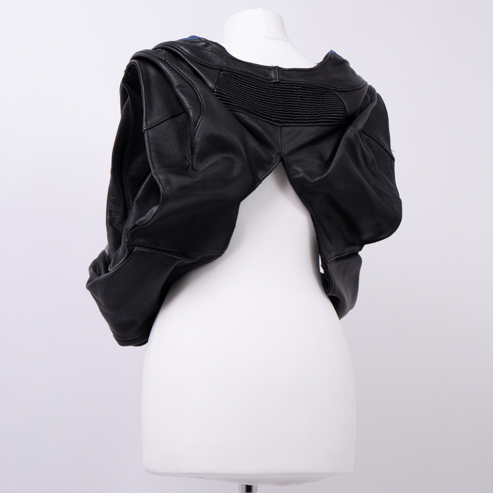 Shop online from our exclusive website and discover the Exosphere Leather Top by Voitech®, crafted from premium multi-texture leather with an exoskeletal design and futuristic hardware detailing.
