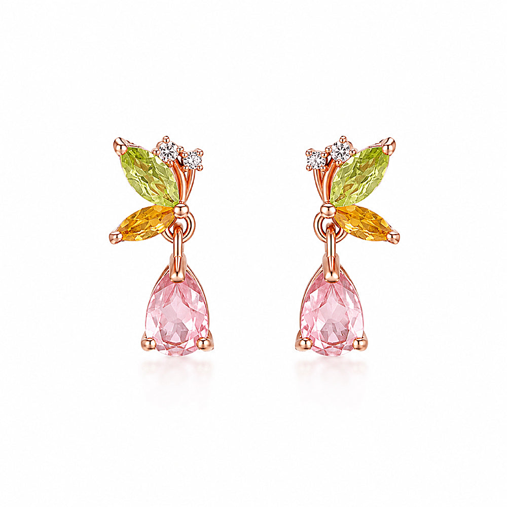 Discover the Fairy Wings Tourmaline Gemstone Stud Earrings at The Luxe Maison, featuring delicate fairy wing-inspired designs crafted in sterling silver and adorned with vibrant natural tourmaline. Combining whimsical charm with subtle sparkle, these lightweight earrings bring a touch of nature-inspired elegance to everyday wear and special occasions.