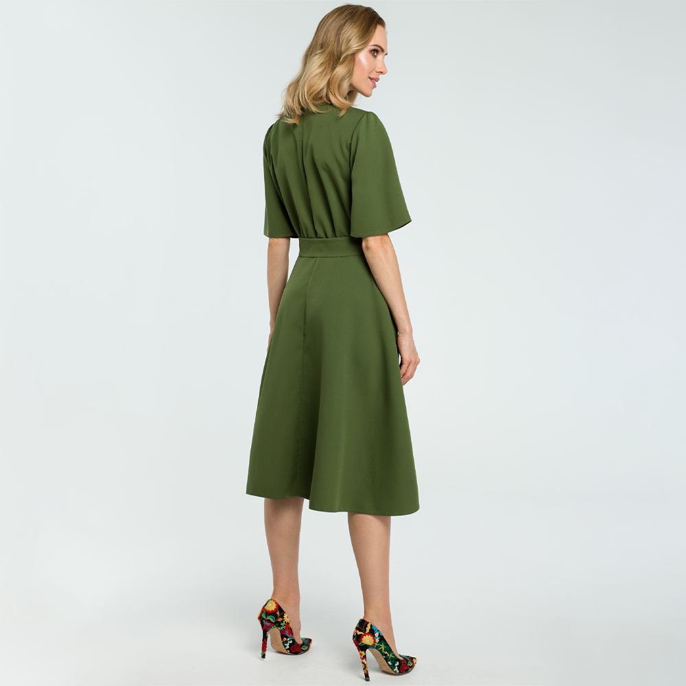 Woven fabric ; fit and flare cut with a side slit ; short bell sleeves and below knee length.