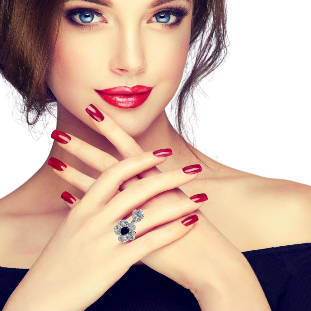 Shop online premium rhodium plated flower ring with blue sapphire & cubic zirconia stones.