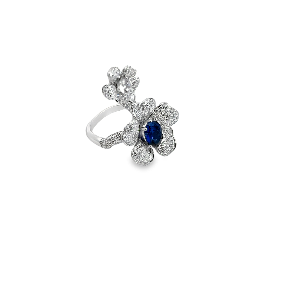 Shop online premium rhodium plated flower ring with blue sapphire & cubic zirconia stones.