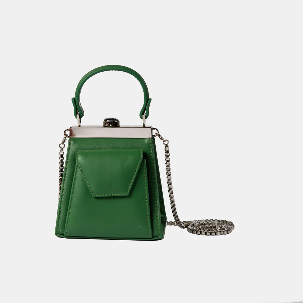 This playful mini bag fuses classic craftsmanship with creative kitsch. Quirky, classy and quintessentially cool.