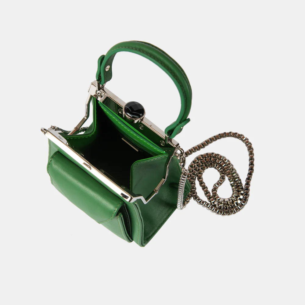 This playful mini bag fuses classic craftsmanship with creative kitsch. Quirky, classy and quintessentially cool.