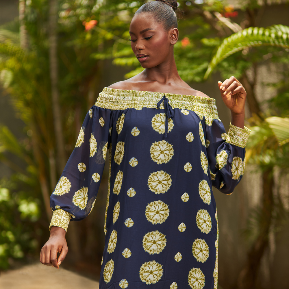 Crafted from a luxurious and lightweight chiffon, this Kwelaku kaftan in a vibrant geometric print is super flattering.