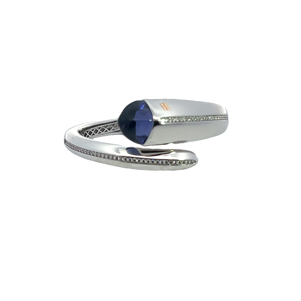 Elegant rhodium plated cuff bracelet with a colored pyramidal crystal and sparkling pavé cubic zirconia accents. A chic luxe accessory for every occasion. Shop premium jewelry online.