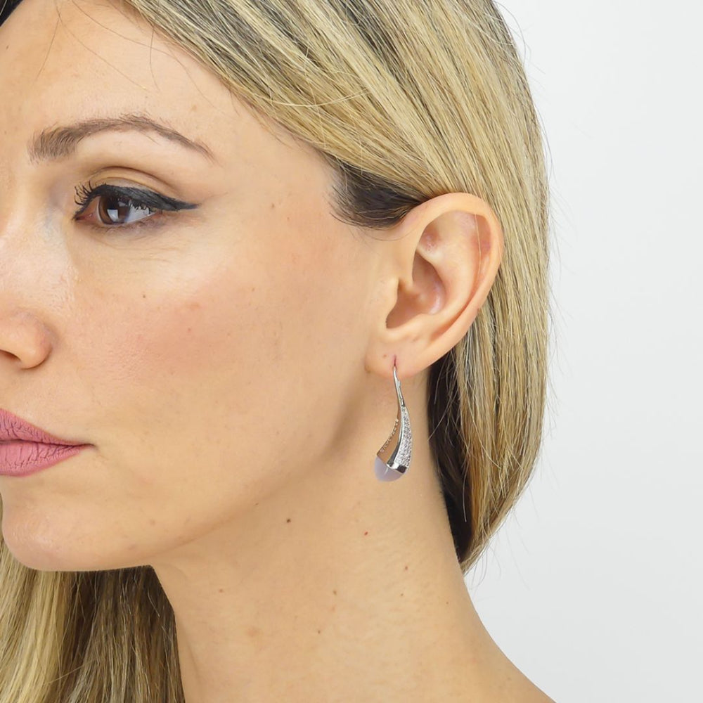 Shop online premium gold plated spring earrings with pyramidal crystals and pave cubic zirconia base in elegant dangler style.