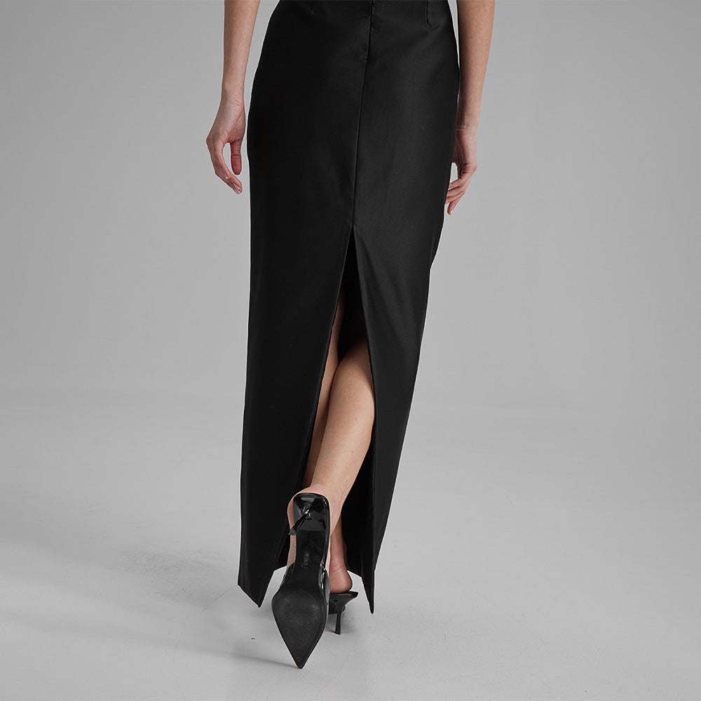 Explore our curation of timeless designer dresses with Gigi black strapless dress with a white cape bow that showcases an elegant silhouette. Shop now!