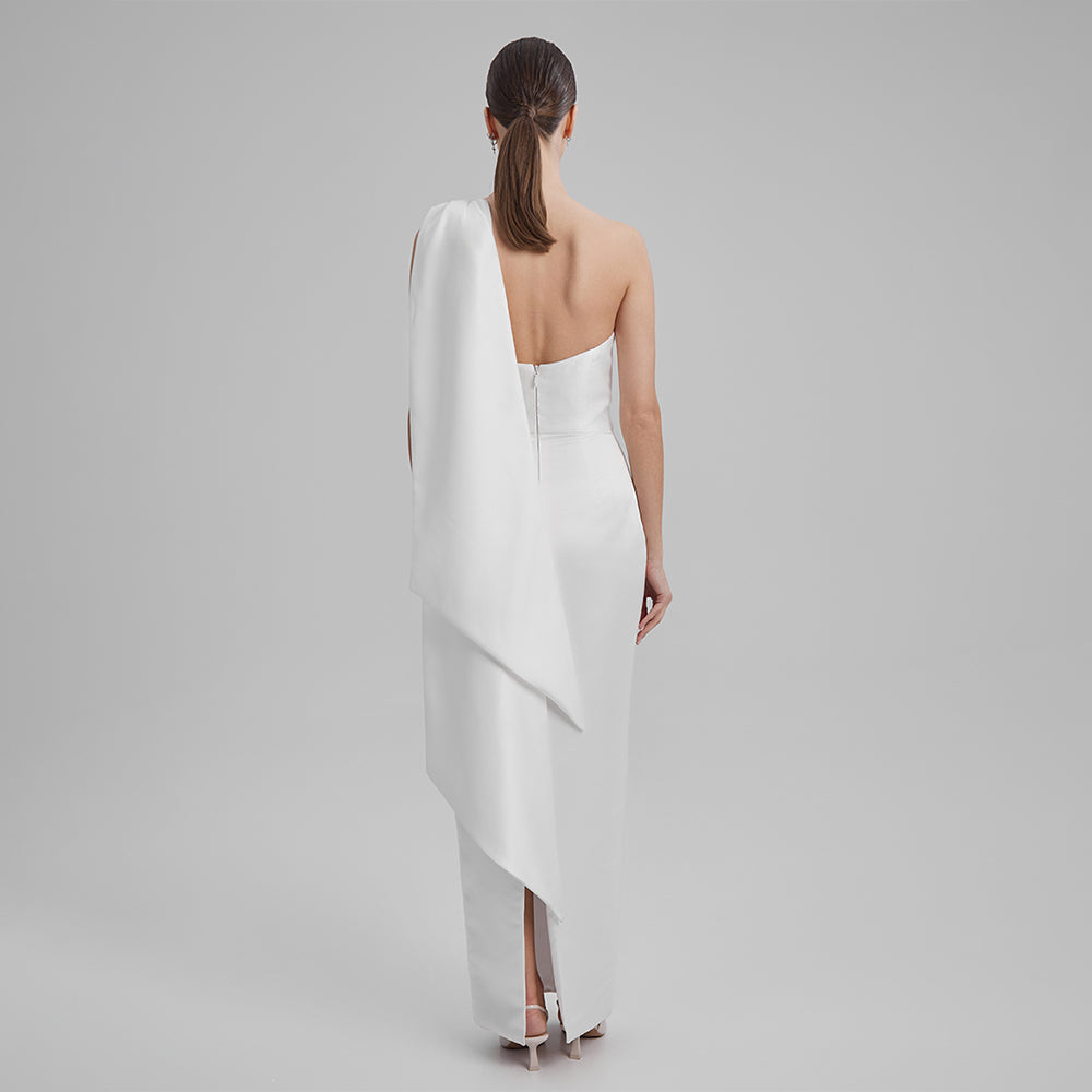 Explore our curation of timeless designer dresses with Gigi white strapless dress with a white cape bow that showcases an elegant silhouette. Shop now!