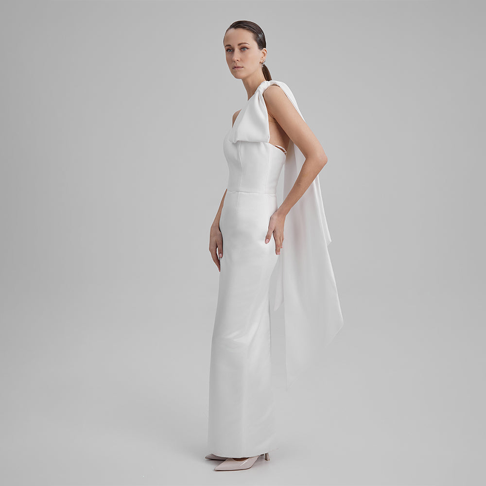 Explore our curation of timeless designer dresses with Gigi white strapless dress with a white cape bow that showcases an elegant silhouette. Shop now!