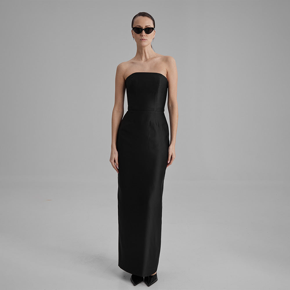 Gigi black strapless dress that showcases a refined simplicity that accentuates your natural grace. Explore our curation of designer dresses. Shop now!