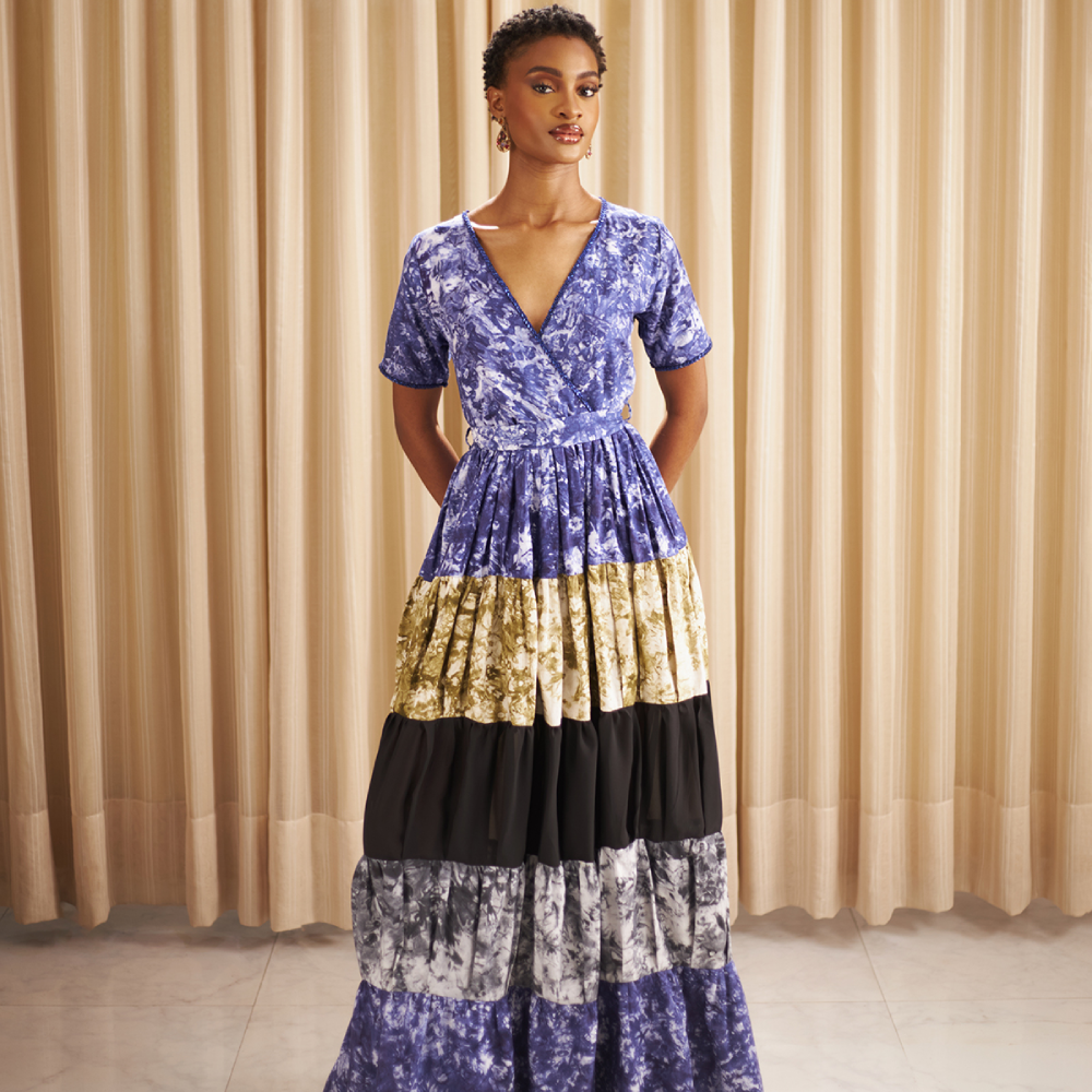 Crafted from hand dyed batik,this Kwelaku exclusive Ginika dress features a full, tiered flowy contrast hem.