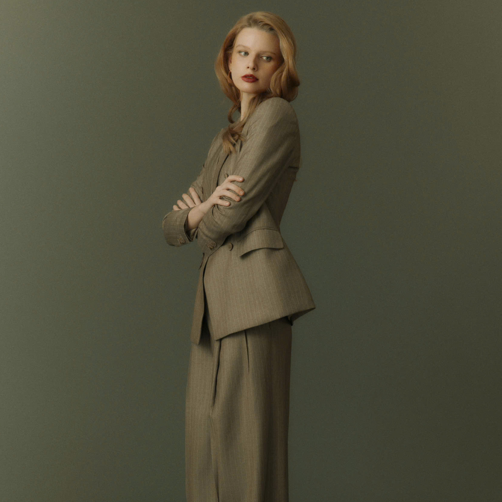 Glimmer blazer in high end clothing elevates elegance with ease. Shop Now!