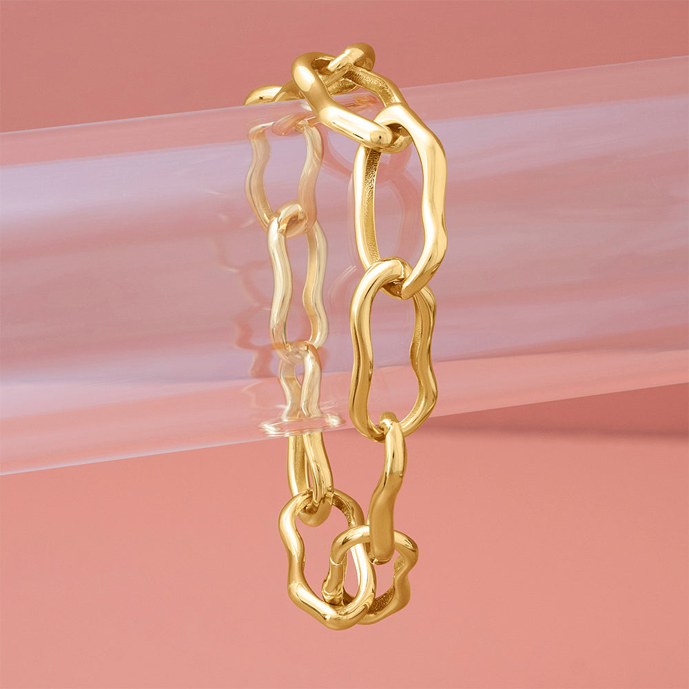 Unveil elegance with our Gold Molten Chain Bracelet, perfect for any outfit. Explore stylish options in our accessories online shop. Shop Now!