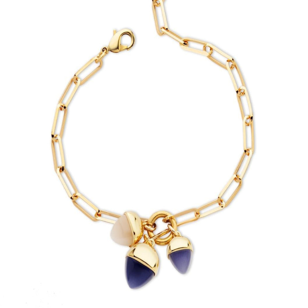 Elegant yellow gold plated bracelet with tanzanite and moonstone pyramid crystals on a chic paperclip link chain. Perfect for luxe everyday styling. Shop premium jewelry online.