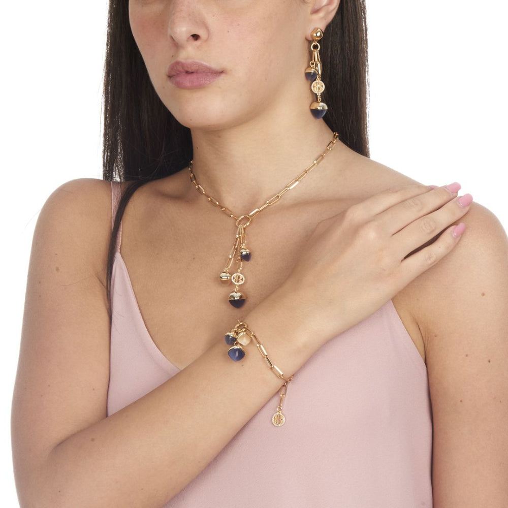 Shop online premium rose gold plated dangle earrings with pink quartz pyramidal crystal on elegant oval counter link detailing.