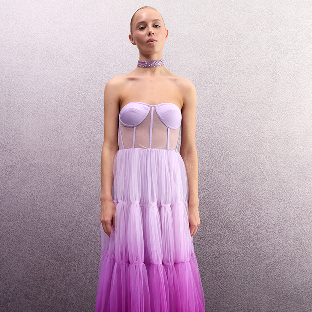 Introducing the "Radiant Ombre Corset Gown," meticulously handcrafted to celebrate femininity with delicate craftsmanship.