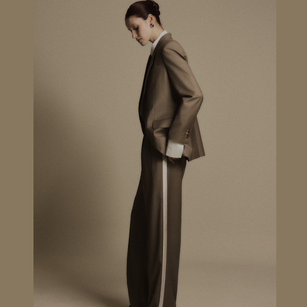 Discover refined women fashion featuring the elegant Granite Brown Wool Wide Leg Suit Jacket. Shop Now!