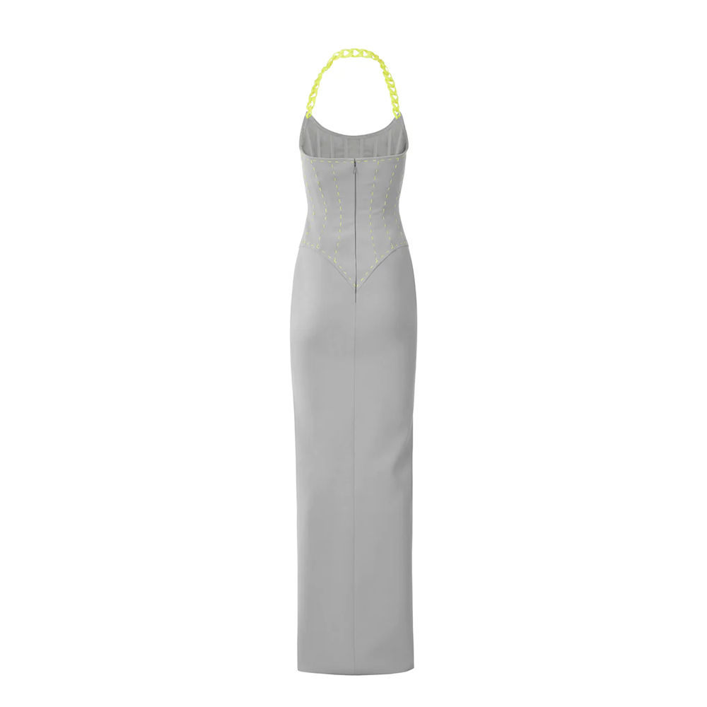 A grey silk crepe corseted dress with neon yellow stitches and chain.