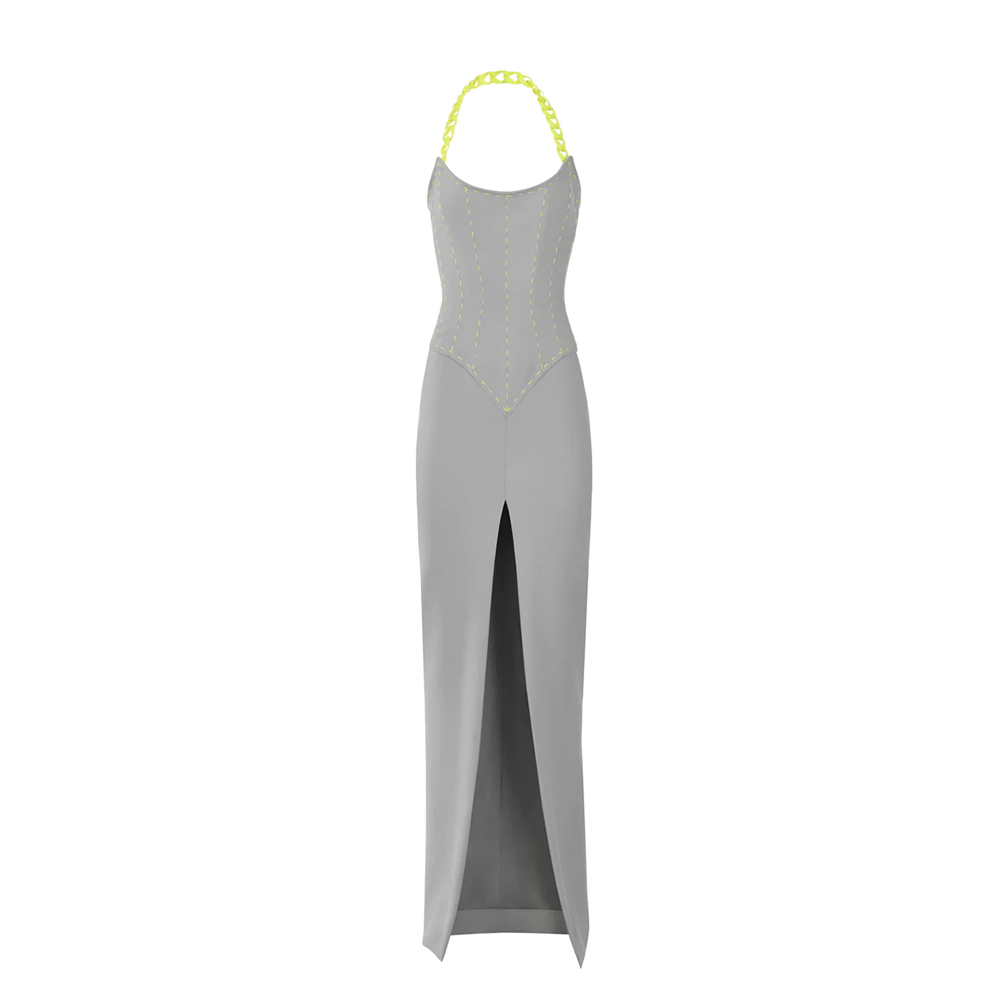 A grey silk crepe corseted dress with neon yellow stitches and chain.