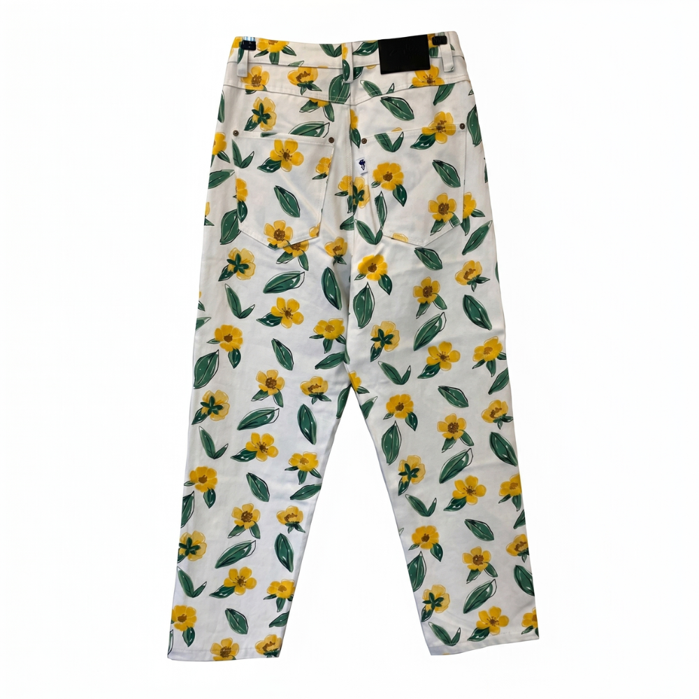 High-waisted floral denim pants in 100% recycled cotton. Shop premium styles online.