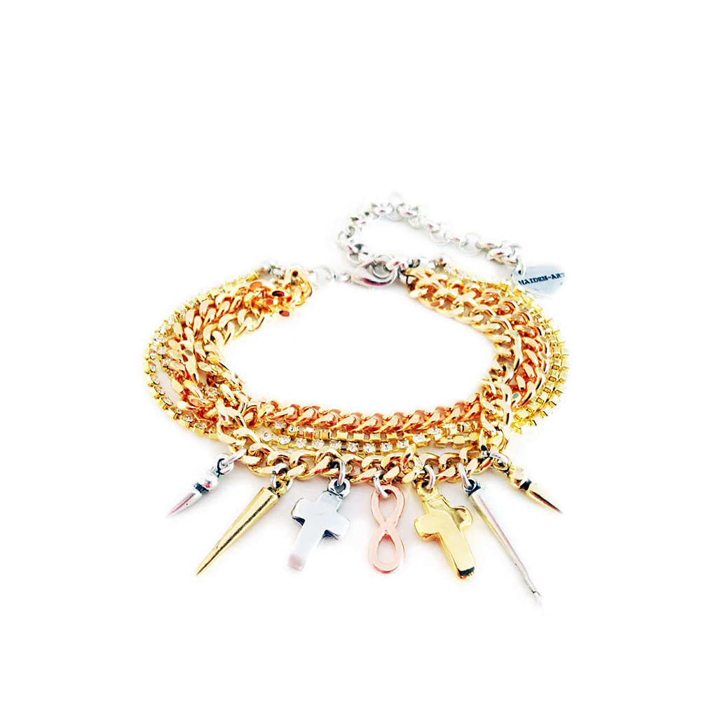 This handmade bracelet with Swarovski crystals, silver and gold charms. 
