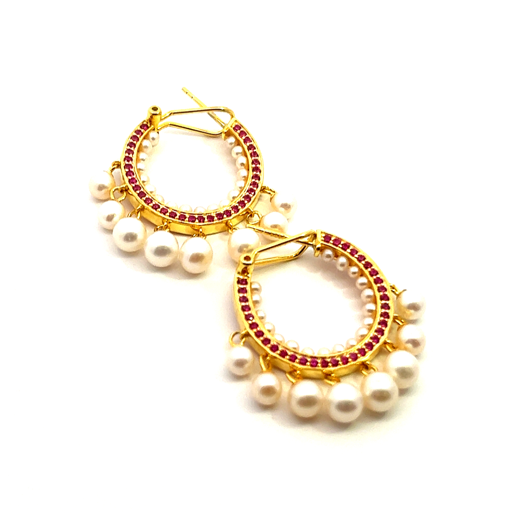 Shop online premium 18K gold pearl hoop earrings with ruby accents and dangling pearls.