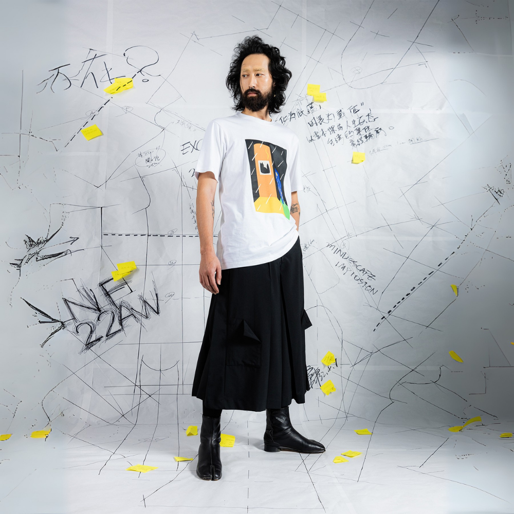 Admire the INF X Artist Crossover T shirt at the luxe clothing store. Shop Now!