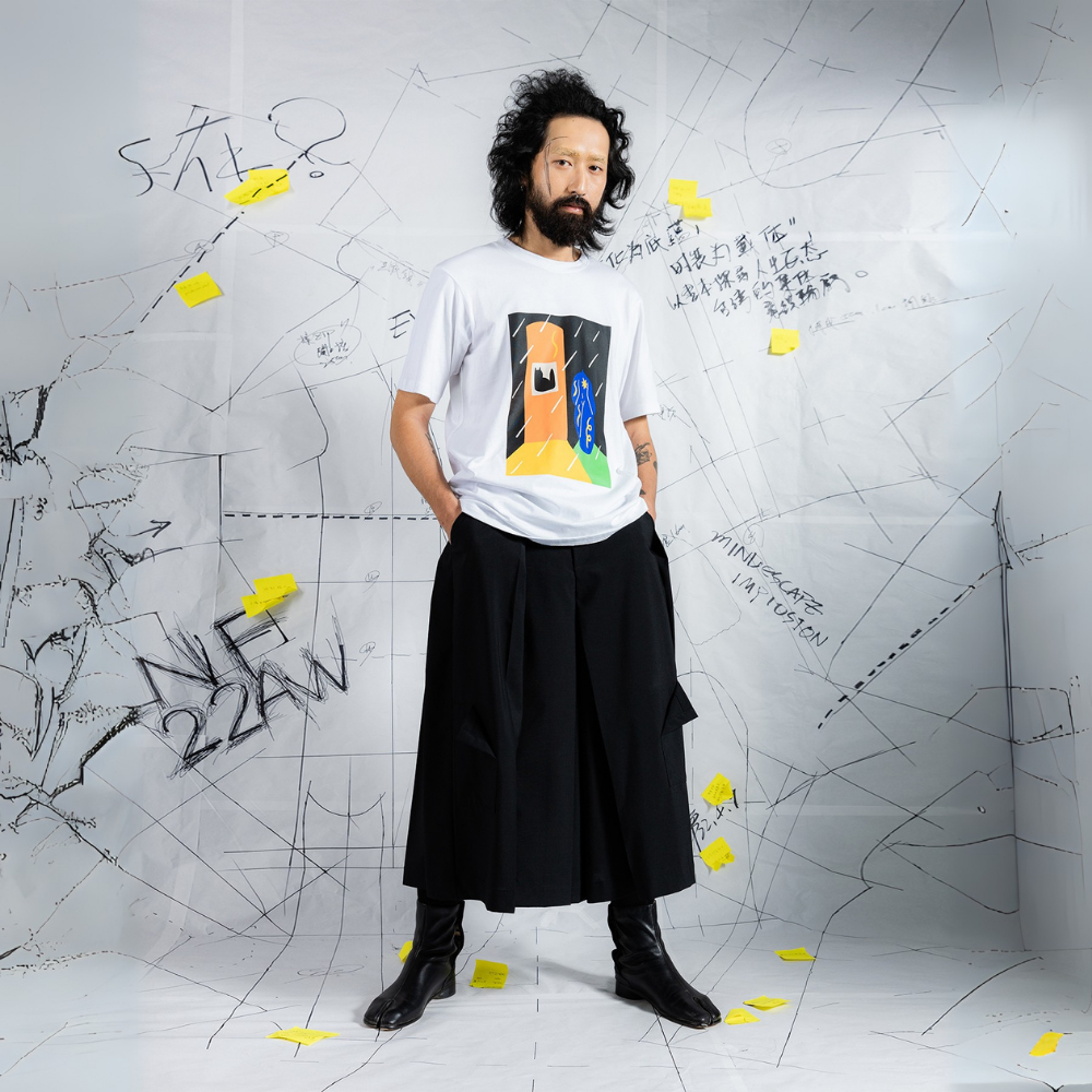 Admire the INF X Artist Crossover T shirt at the luxe clothing store. Shop Now!