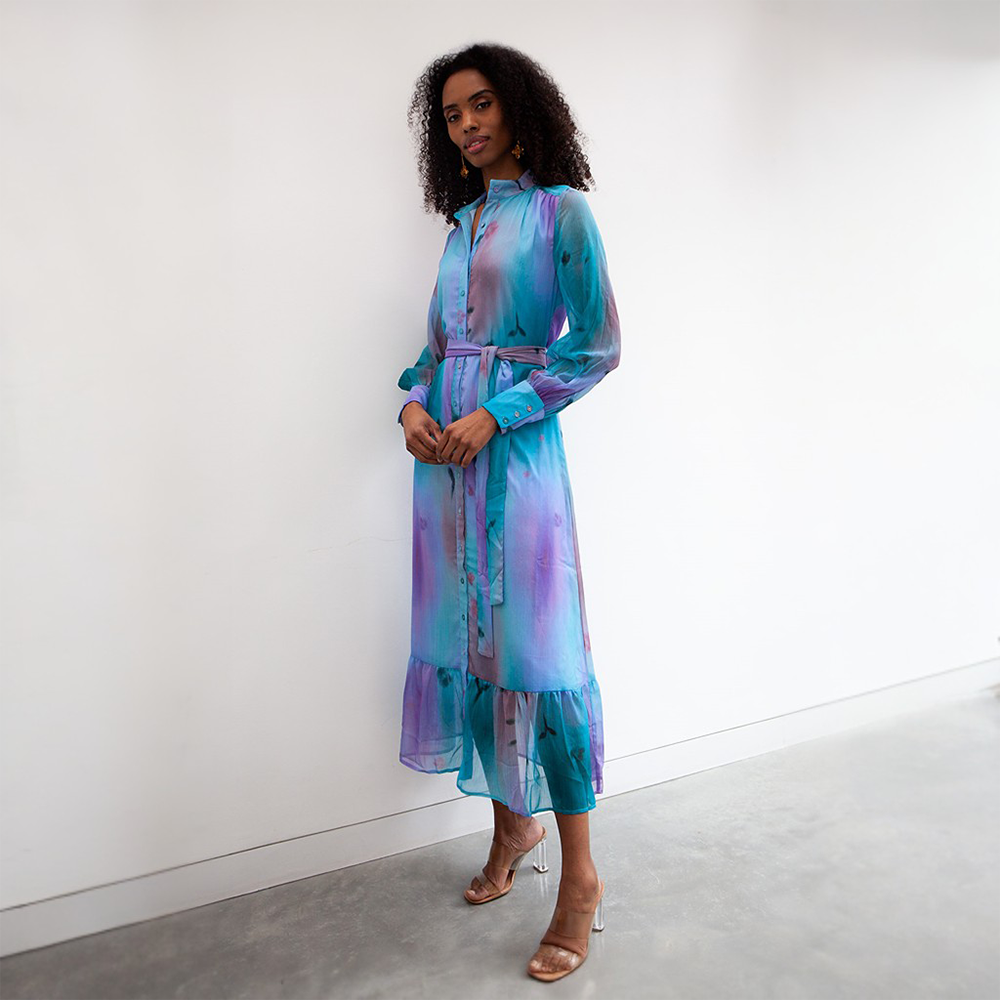 The Immi dress is a stunning maxi-length dress with gorgeous hues of blue and purple. 