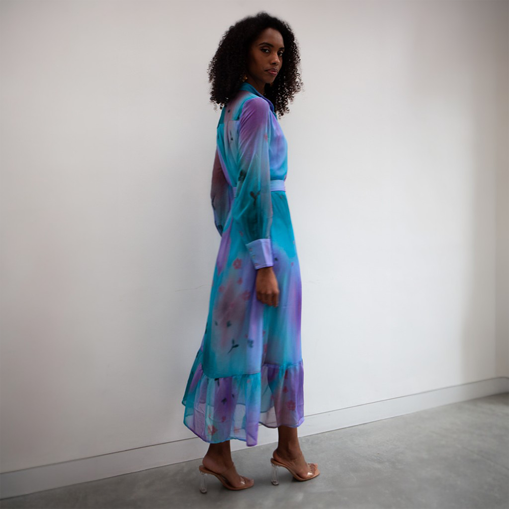 The Immi dress is a stunning maxi-length dress with gorgeous hues of blue and purple. 