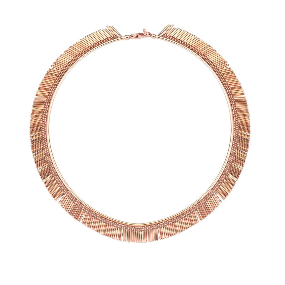 This unique choker is inspired by the rays of sun radiating with each movement. 18ct Rose Gold Plated Choker.