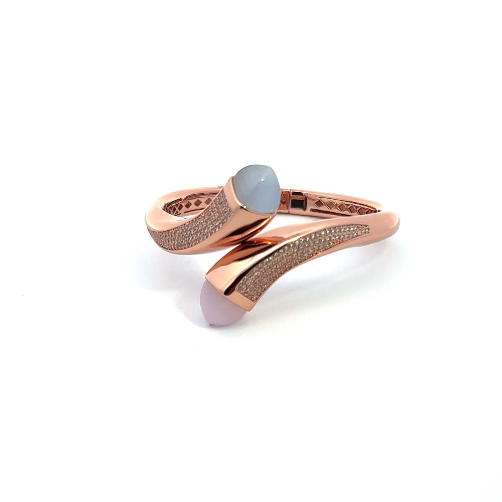 Elegant rose gold plated wrap cuff bracelet with rose quartz, mother of pearl crystals, and pavé cubic zirconia accents. Perfect for luxe everyday styling. Shop premium jewelry online.