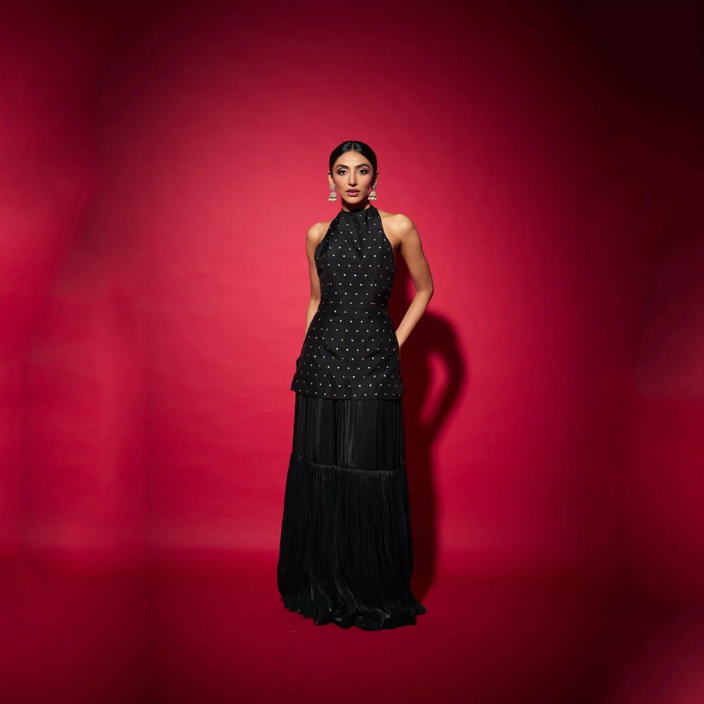Brocade top with ruched satin skirt and brooch detail, perfect for festive wear. Shop online from our curated edit of premium fashion.