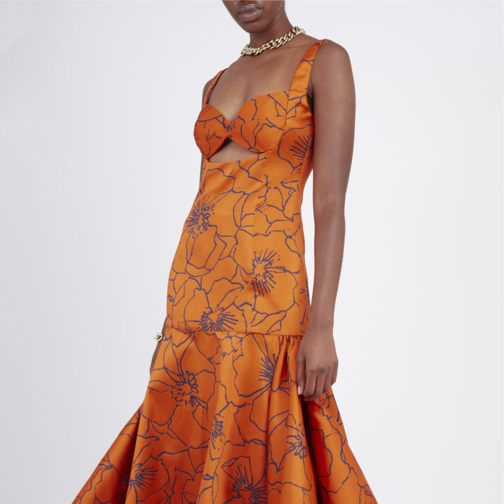 This strapless midi dress has strategically placed seams, a flattering front cutout and a corseted bodice.