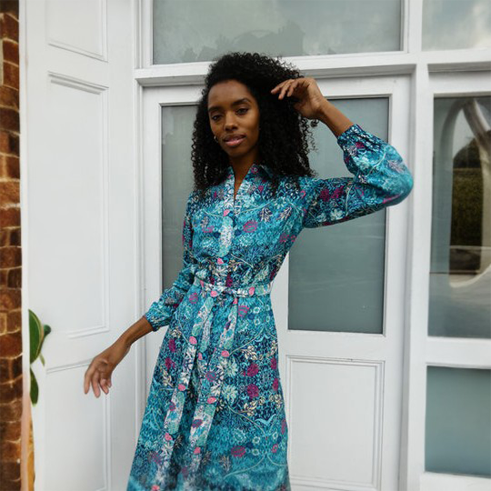 The Jolene Dress is a beautiful midi blue printed shirt dress with a front placket and cuff detail. 