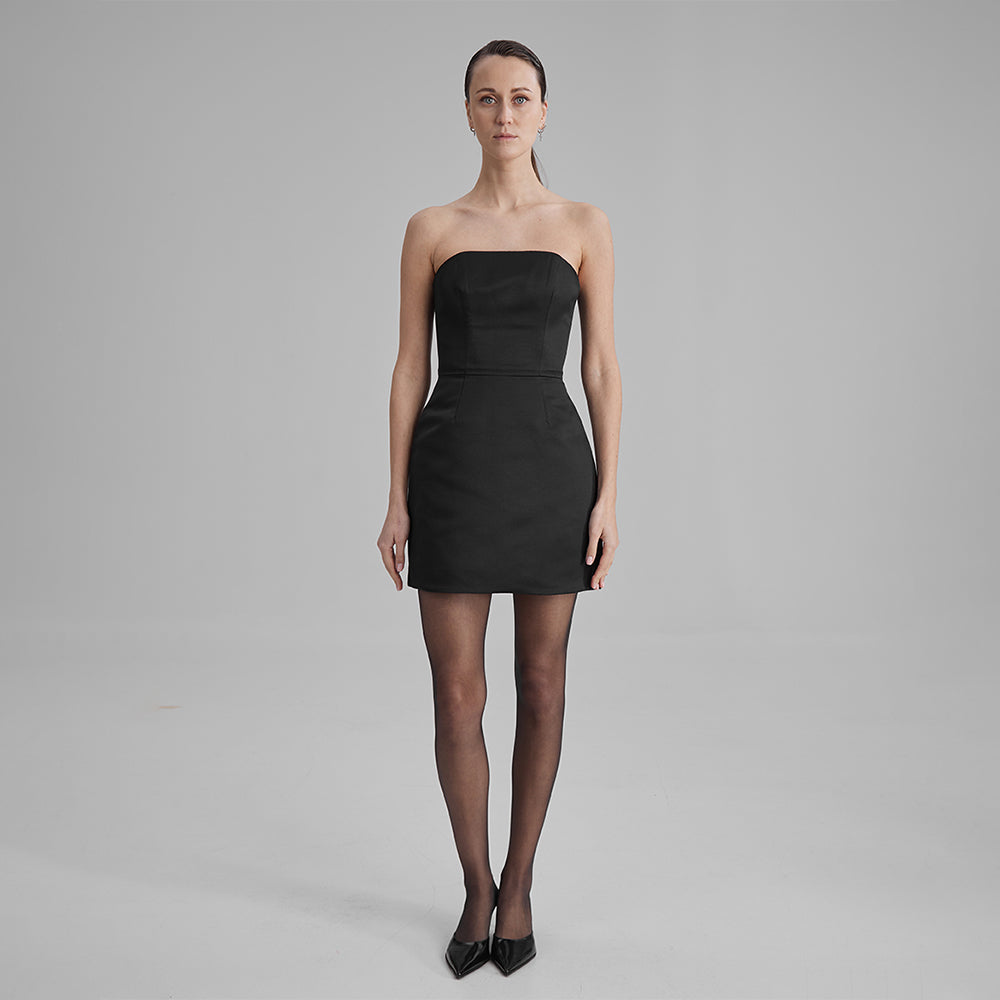 Step into the world of contemporary elegance with our black mini dress with strapless corset. Explore our range of mini dresses for women. Shop now!