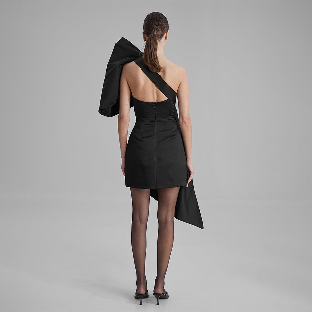 Shop our black mini dress crafted from Mikado with strapless corset and a removable bow. Explore our range of designer dresses for women. Shop now!