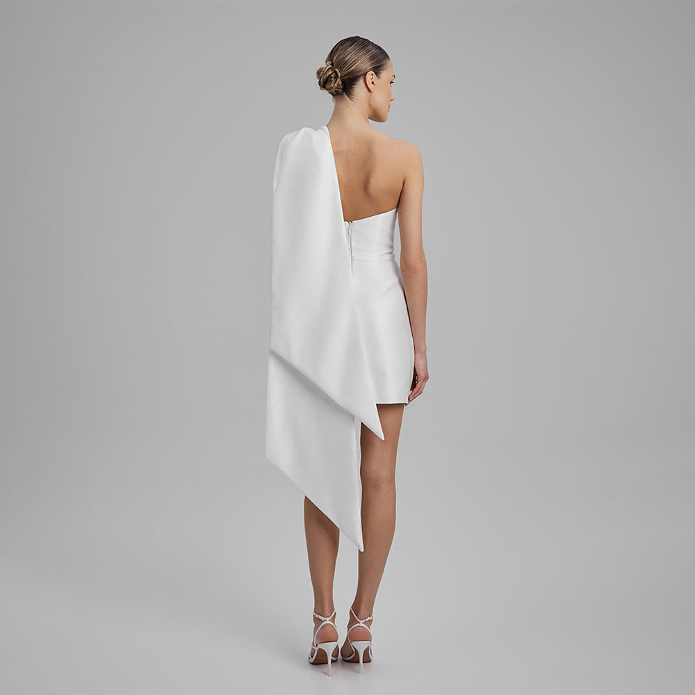 Shop our white mini dress crafted from Mikado with strapless corset and removable cape bow. Explore our range of designer dresses for women. Shop now!