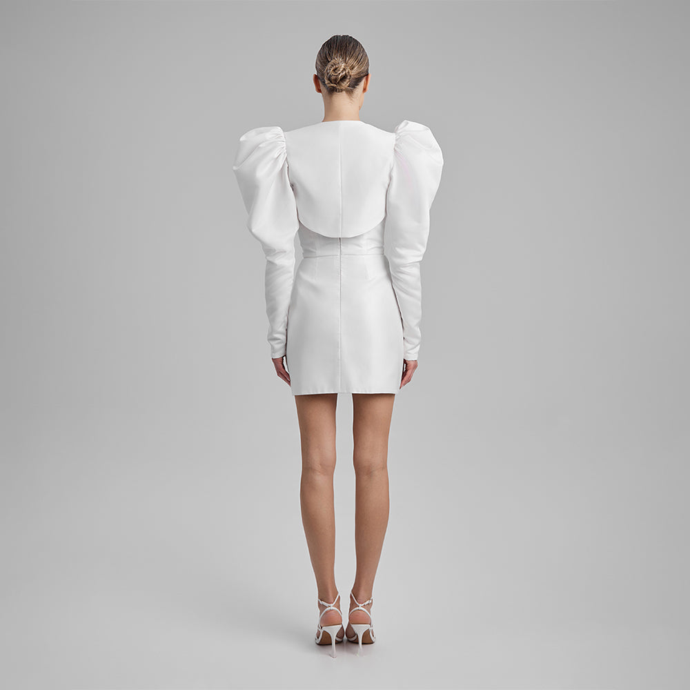 Shop our white mini dress crafted paired with puff sleeved bolero and strapless corset. Explore our curation of mini dresses for women. Shop now!