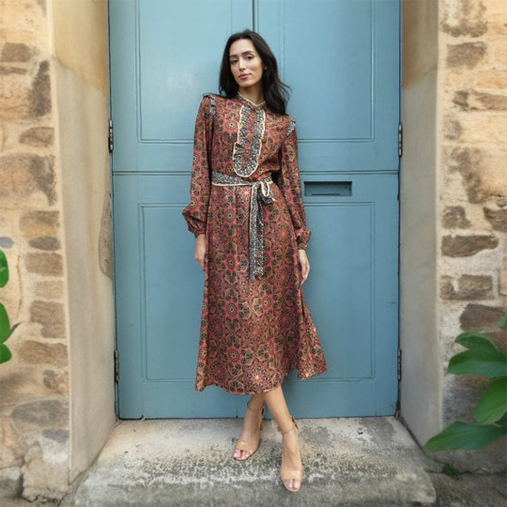 The Judy dress is a fabulous midi crepe printed dress in earthy tones with long sleeves perfect for this season. 