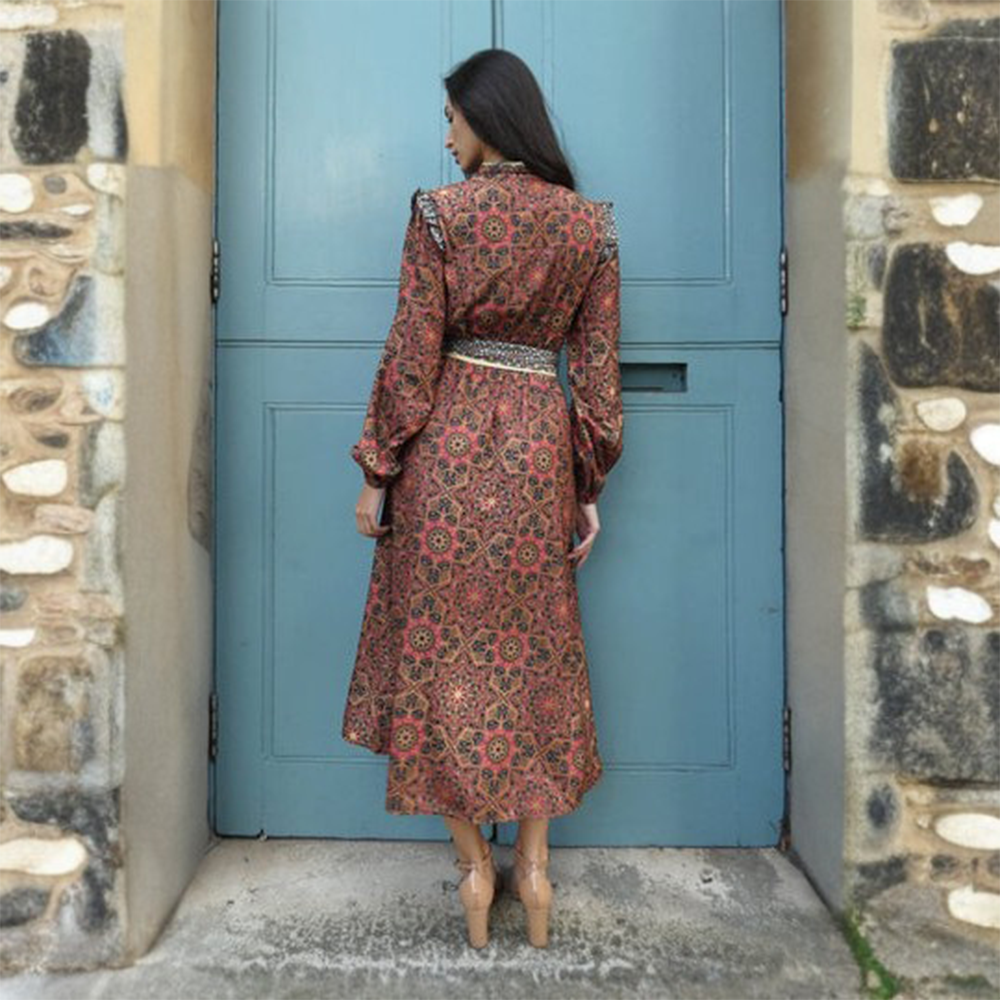 The Judy dress is a fabulous midi crepe printed dress in earthy tones with long sleeves perfect for this season. 
