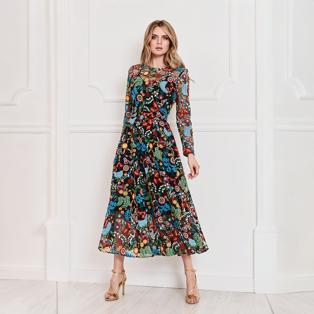 This unique, gorgeous floral evening midi dress offers a colorful, artsy alternative to your formalwear wardrobe.