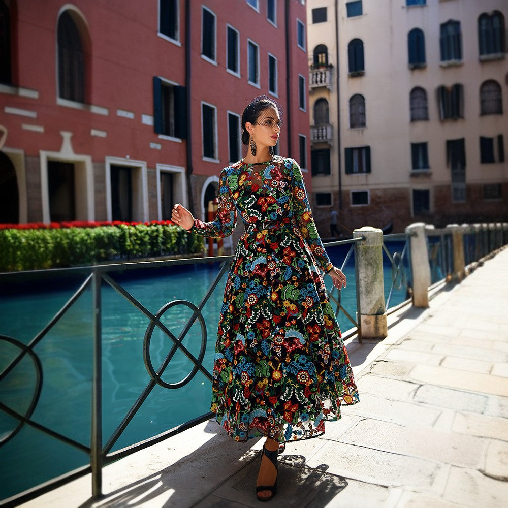 This unique, gorgeous floral evening midi dress offers a colorful, artsy alternative to your formalwear wardrobe.