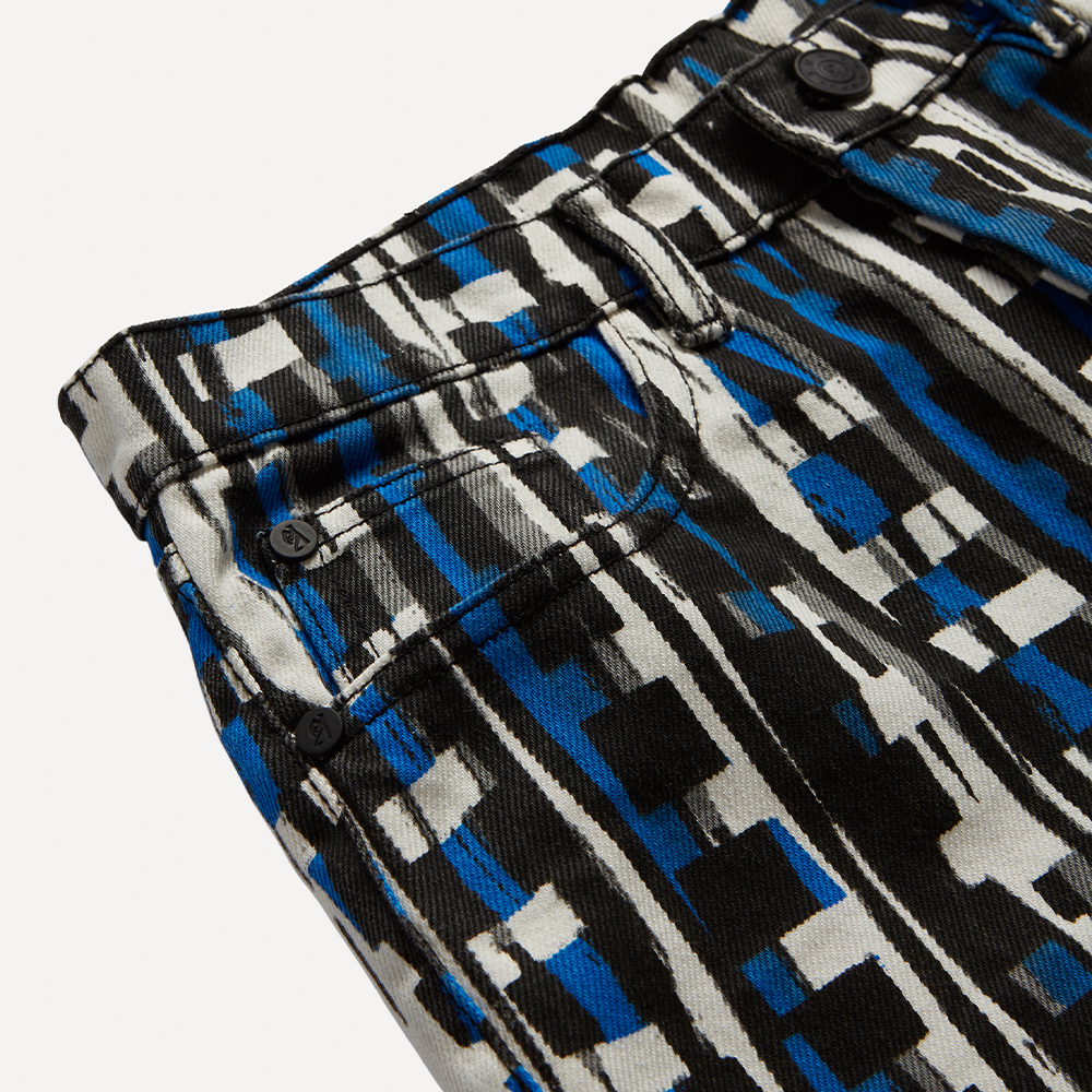 Cut from organic 100% cotton mid-weight printed denim in Klein blue, black and white. Mid-rise, straight leg fit 